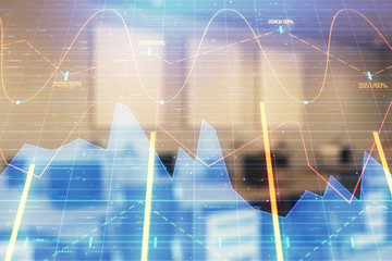 Stock market chart with trading desk bank office interior on background. Double exposure. Concept of financial analysis