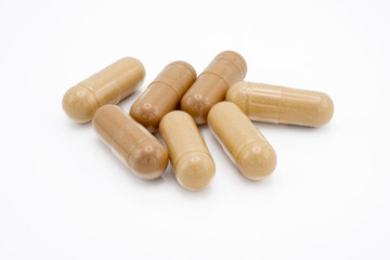 herbal medicine capsules isolated on white background