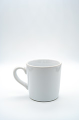 White coffee cup There is a glass handle on the left With a white background, isolated