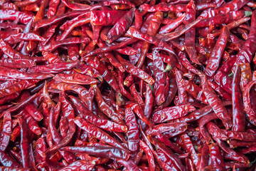 Fototapeta premium closeup red dried chili peppers, Cayenne pepper, chili spur pepper, long fed pepper , background red chili 