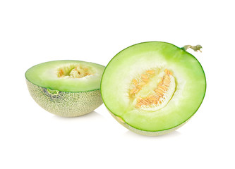 half cut ripe melon with stem on white background