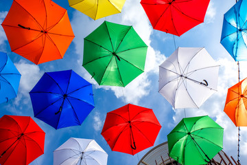 Colorful umbrellas background. Colorful umbrellas in the sky. Street decoration.