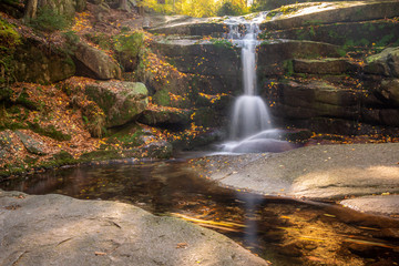 Fototapeta na wymiar Waterfall Kaskady Myi in autumn in Sudety mountains, Przesieka, Poland