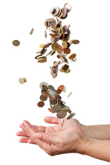Coins falling down in the palm of a hand