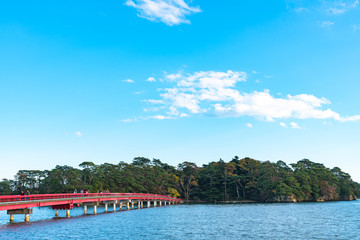 Fukuura Island with Fukuura Bridge in the famous Matsushima Bay. Beautiful islands covered with pine trees and rocks. One of the Three Views of Japan. Miyagi Prefecture, Japan