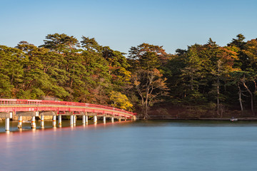 Fukuura Island with Fukuura Bridge in the famous Matsushima Bay. Beautiful islands covered with pine trees and rocks. One of the Three Views of Japan. Miyagi Prefecture, Japan
