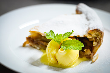 home made apple strudel  with vanilla ice cream