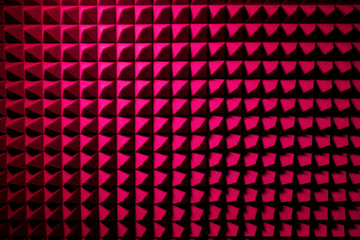 Recording studio sound dampening acoustic foam, background. Noise isolating protective and shock, texture. Background of sound absorbing sponge, wall soundproofing