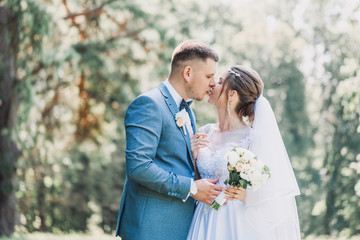 bride and groom kiss