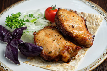 Skewers of chicken with thin pita bread . catering menu