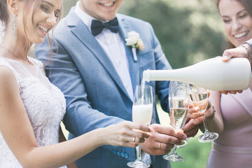 Hands with glasses of champagne, close-up