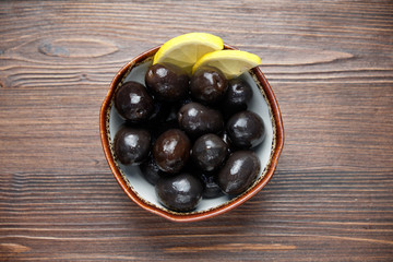 Olives and olives with lemon. menu for catering