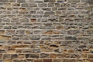 The Weathered Wall of a Vintage Stone Built Building.