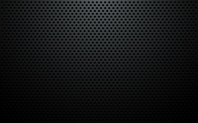 Perforated black metal sheet background