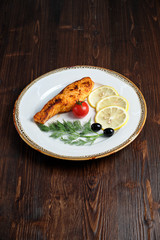 Grilled salmon steak with side dish . catering menu