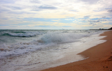Beach and red sand and white cloud,Rayong ,Thailand.