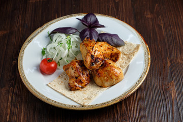 Skewers of chicken with thin pita bread . catering menu