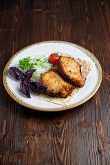 Skewers of chicken with thin pita bread . catering menu