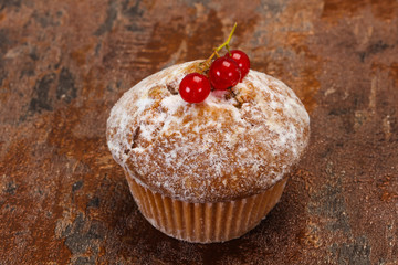 Sweet tasty muffin with red currants