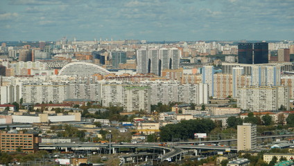 Moscow cityscape. Urban houses against the blue cloudy sky