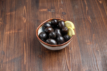 Olives and olives with lemon. menu for catering