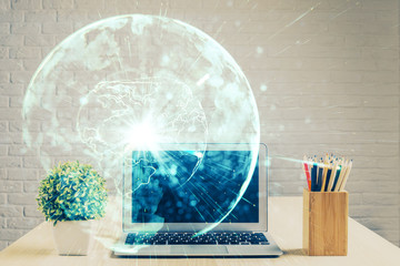 Double exposure of business theme icons and work space with computer background. Concept of success.