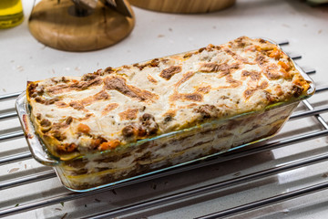 Lasagna with Minced Meat Beef and Bechamel Sauce in Glass Bowl. / Classic Italian Dish.