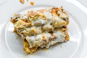 Lasagna with Minced Meat Beef and Bechamel Sauce in Plate. / Classic Italian Dish.