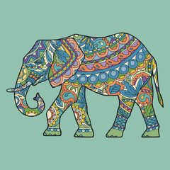 Vector silhouette of adult elephant, side view. Big elephant in motion. Colorful elephant in ethno style. A festive elephant on a green background. The silhouette is drawn manually.