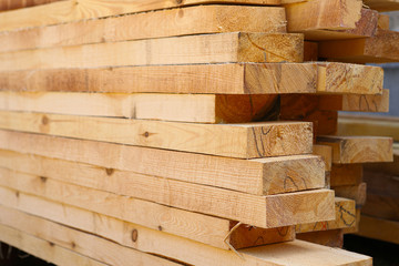 Wooden beams for prefabricated construction with low depth of field