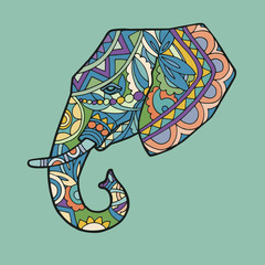 Vector image of the elephant head in position - profile. The colorful head of the elephant in an ethno style. Illustration of the head of an elephant with a ear, a tusk, an eye, a trunk.