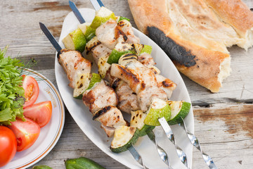 Shish kebab with vegetables. Grill meat and vegetables