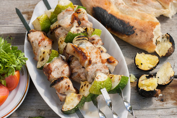 Shish kebab with vegetables. Grill meat and vegetables