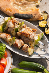 Shish kebab with vegetables. Grill meat and vegetables