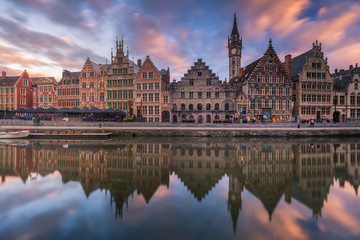 Fototapeta na wymiar Facade of historical building with reflection with vibrant sky at Gent, Belgium