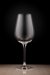 empty wine glass on a dark background