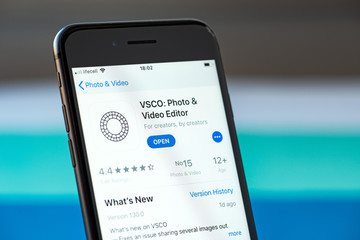 Kyiv, Ukraine - September 17, 2019: Studio shot of Apple iPhone 8 smartphone with VSCO mobile application on the screen