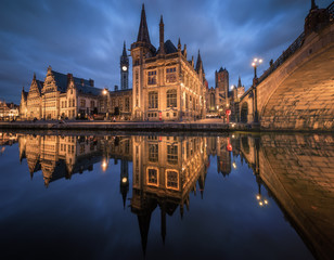 Historical buildings with reflection during twilight at Gent, Belgium