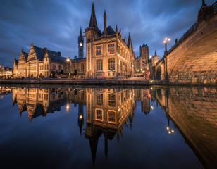 Fototapeta premium Historical buildings with reflection during twilight at Gent, Belgium