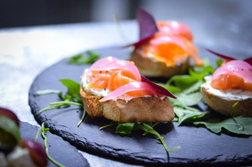 mix bruschetta with fresh vegetables, goat cheese & grapes