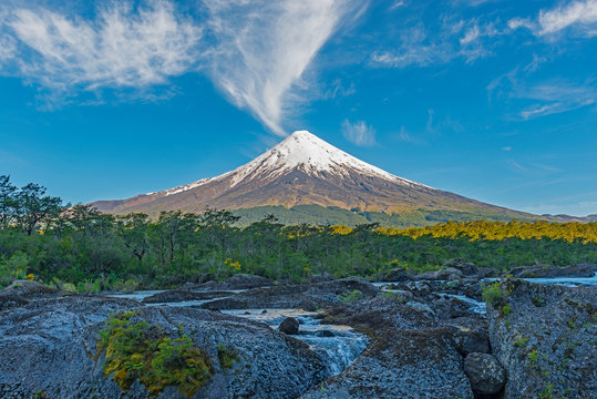 Sunrise by the Osorno volcano with the Petrohue waterfalls and river, Chilean Lake District near Puerto Varas and Puerto Montt, South Chile.