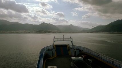 View from bow of cruise ship. Sailboat sailing in Mediterranean sea. Greece. 4K