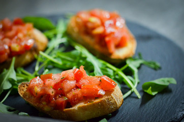 mix bruschetta with fresh vegetables, goat cheese & grapes