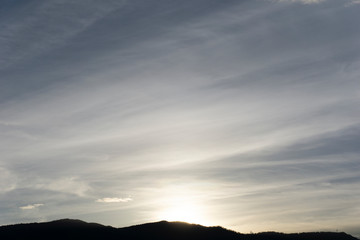 Beautiful Evening Sky just after the sun has set. Dawn with parallel clouds lines formation.