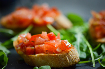 mix bruschetta with fresh vegetables, goat cheese & grapes