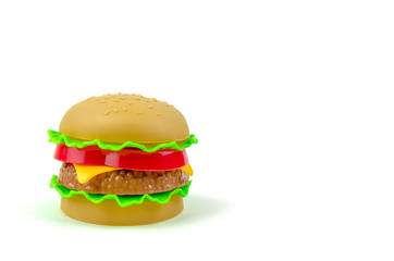 Fast food. A plastic hamburger. Isolated. White background