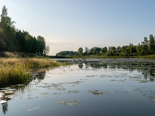 Beautiful morning fog on the lake. Forest, lake,  in the fog. Mysterious fog