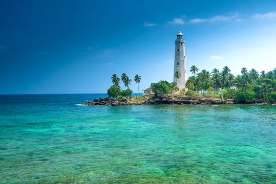 Lighthouse and beautiful beach landscape in Sri Lanka