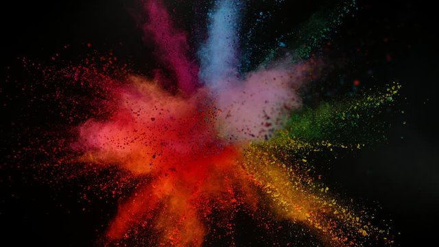 Super slow motion of coloured powder explosion isolated on black background. Filmed on high speed cinema camera, 1000fps.