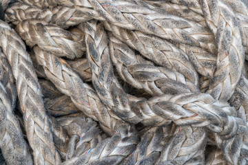 Old and rusty ship rope as background.